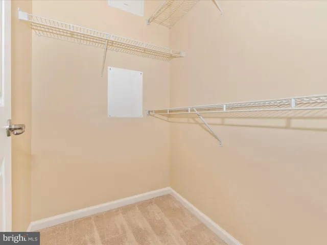 a bathroom with a shower a toilet and a sink