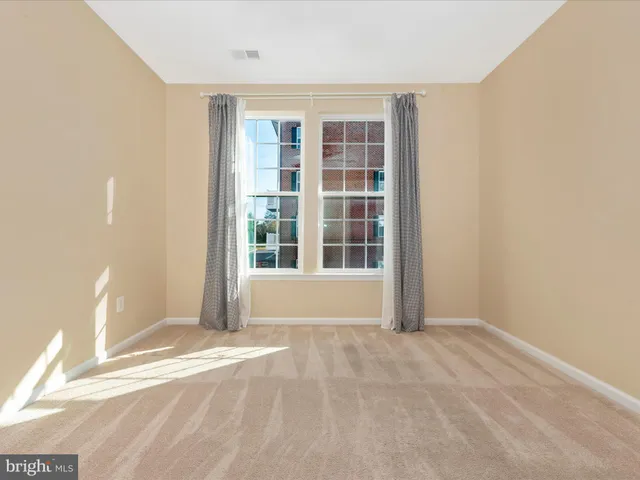 a front view of a house with yard