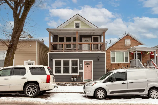 a car parked in front of a house