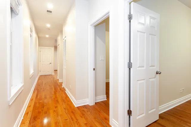 a view of a bathroom with bathtub