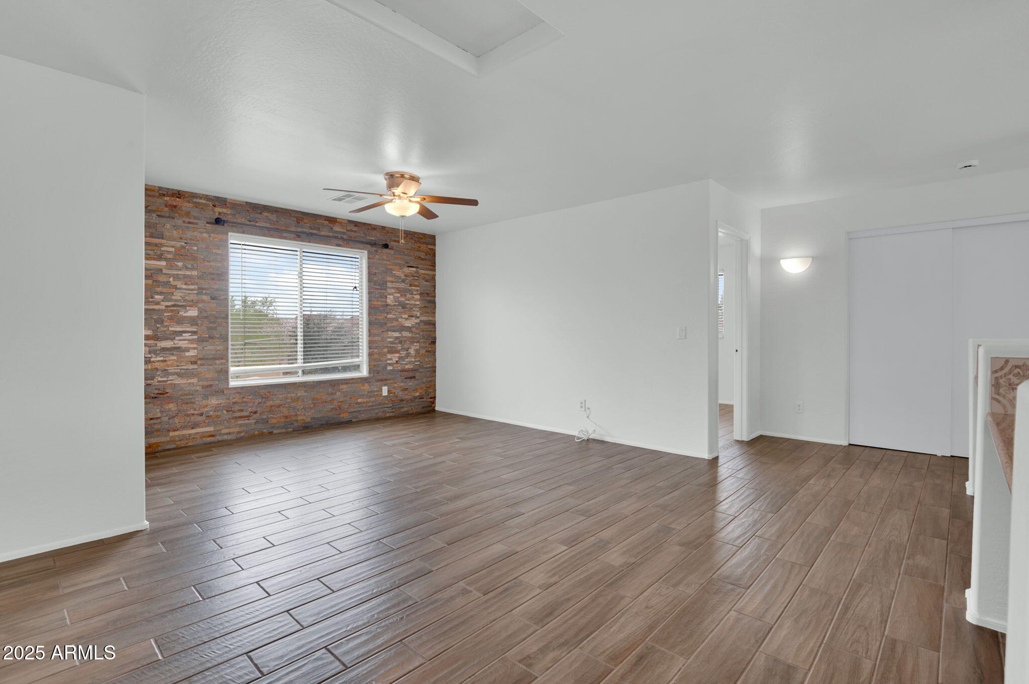 7325 West Williams Street Phoenix, AZ 85043 - Photo 23 of 30 Loft with Custom Stone Wall