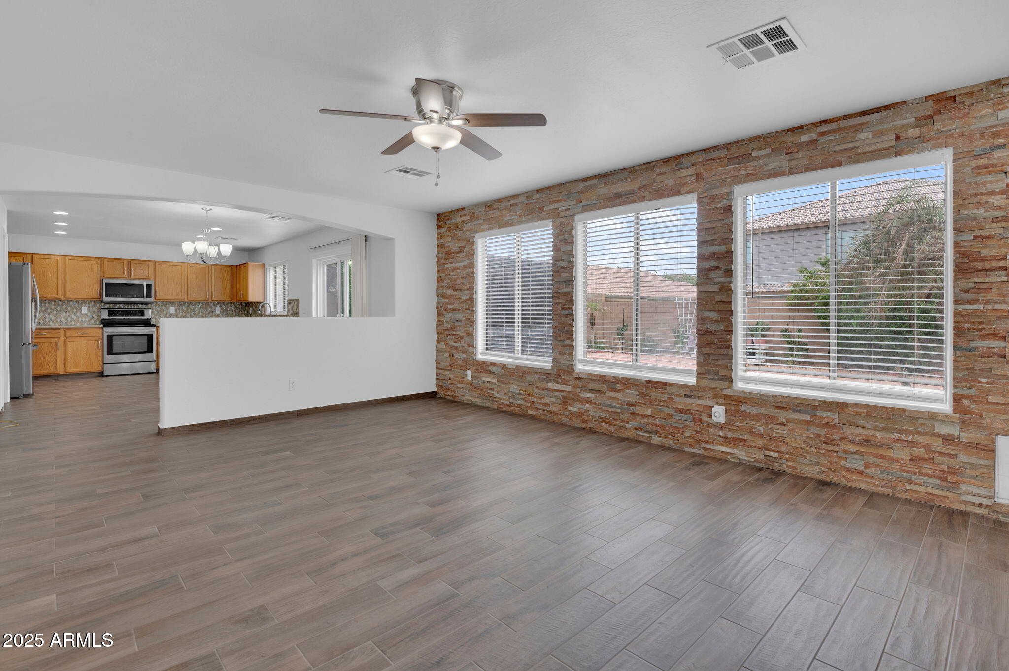 7325 West Williams Street Phoenix, AZ 85043 - Photo 10 of 30 Den - Custom Stone Walls