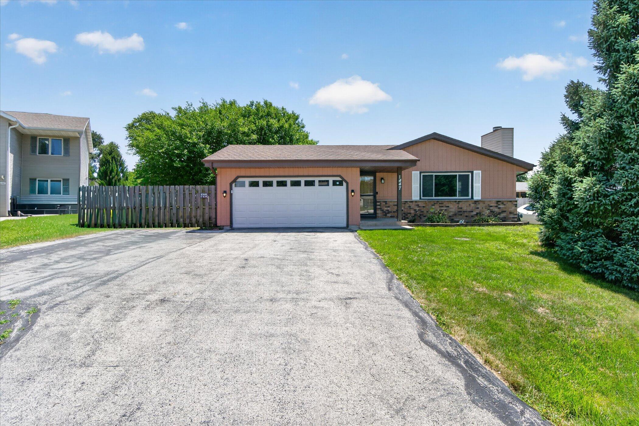 1447 Warwick Way Mount Pleasant, WI 53406 - Photo 2 of 41 02-1447-Warwick-Wy-WindowStill