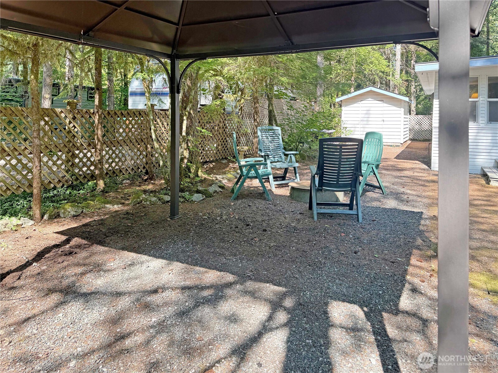 165-4 Christmas Tree Circle Maple Falls, WA 98266 - Photo 14 of 36 a view of a chairs and table in the outdoor space