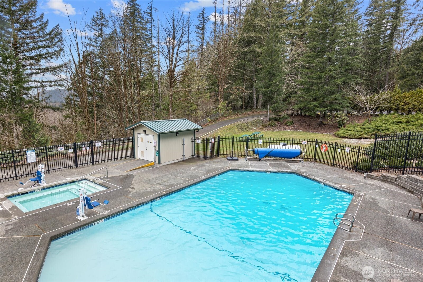 165-4 Christmas Tree Circle Maple Falls, WA 98266 - Photo 25 of 36 a view of a house with pool and sitting area