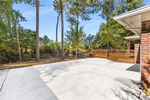 a view of a backyard of the house
