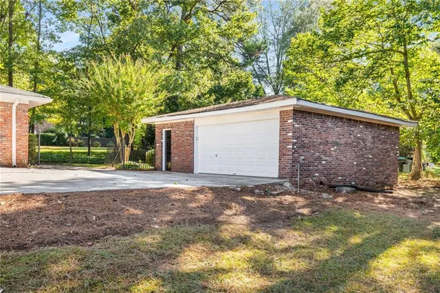 a view of a house with a tree