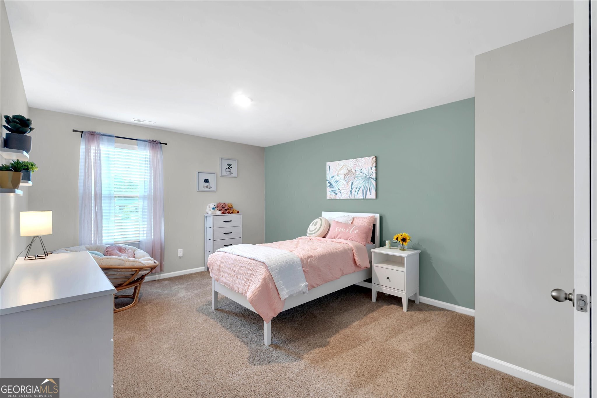 250 Rusty Plow Lane, Unit 25 Perry, GA 31069 - Photo 15 of 25 a bedroom with a bed and a lamp