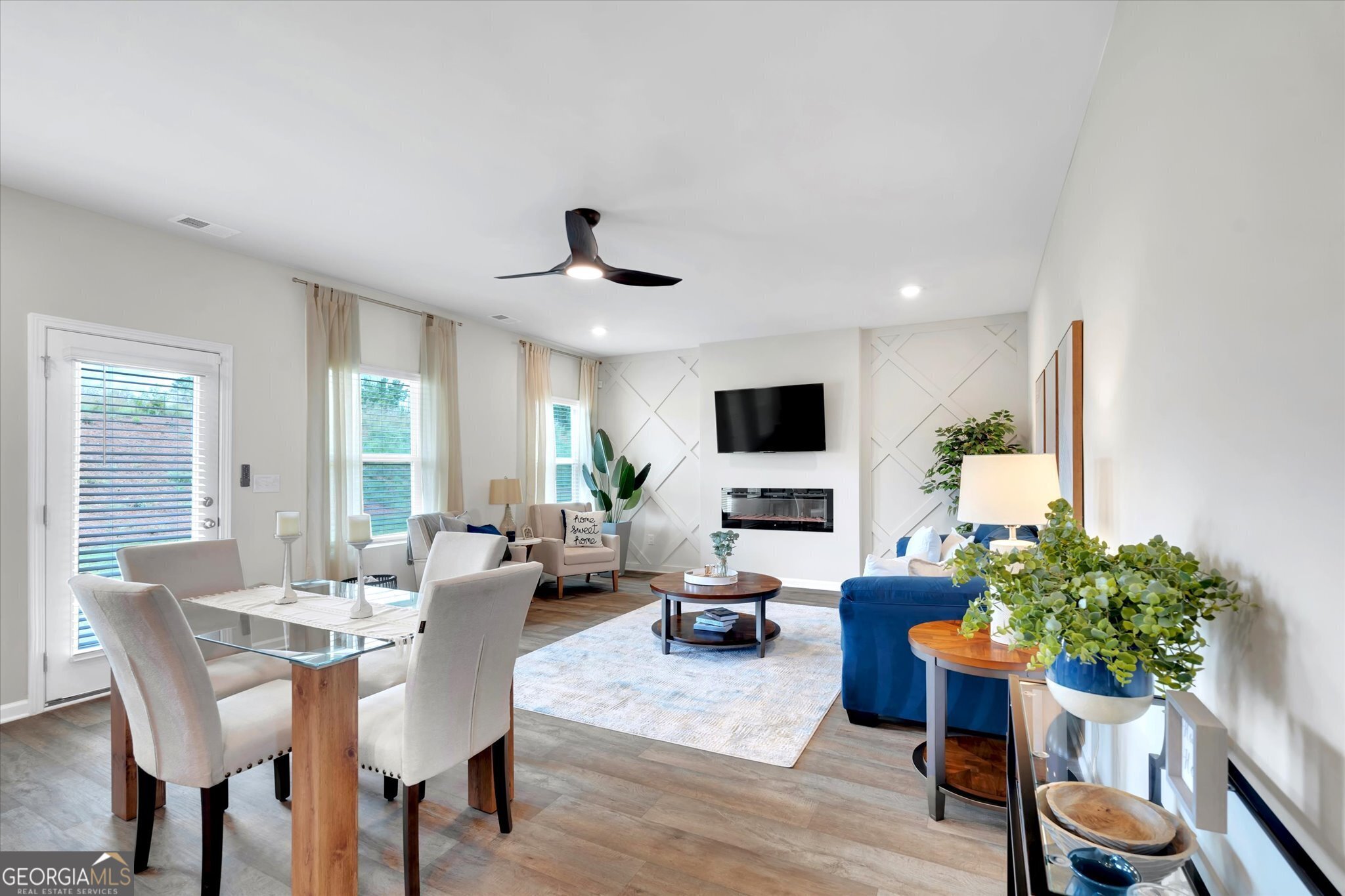 250 Rusty Plow Lane, Unit 25 Perry, GA 31069 - Photo 6 of 25 a living room with furniture and a flat screen tv