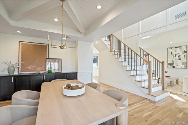 a dining room with furniture and a table