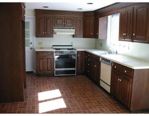 16 Grosvenor Road Needham, MA 02492 - Photo 6 of 7 a kitchen with a sink and a stove