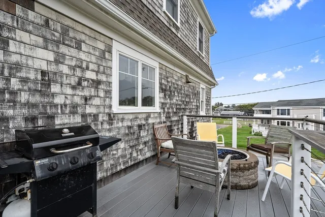 a bathroom with a shower and a sink