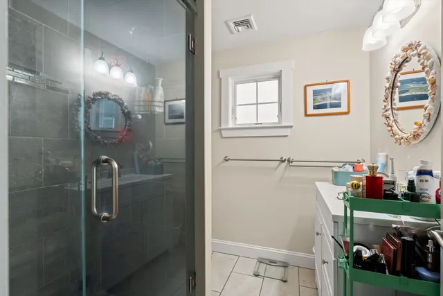 a bedroom with bed and window