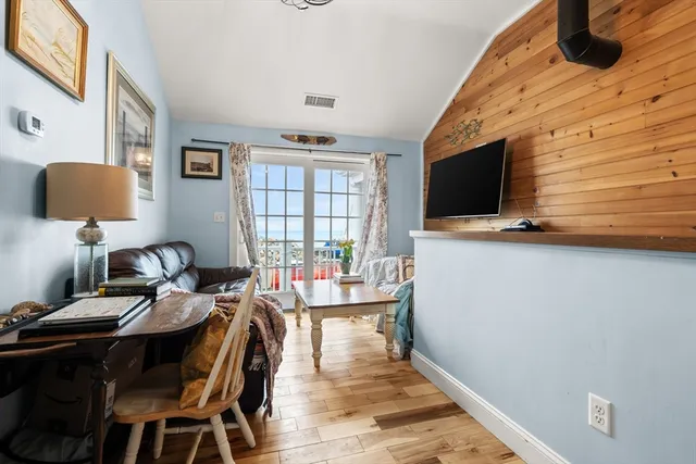 a kitchen with stainless steel appliances granite countertop a stove sink and refrigerator