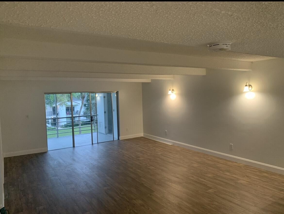 10120 Boca Entrada Boulevard, Unit 307 Boca Raton, FL 33428 - Photo 5 of 26 living room area