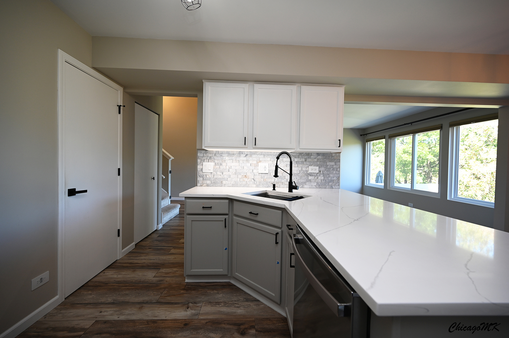 425 Locksley Drive Streamwood, IL 60107 - Photo 15 of 48 a kitchen with a sink stove and cabinets