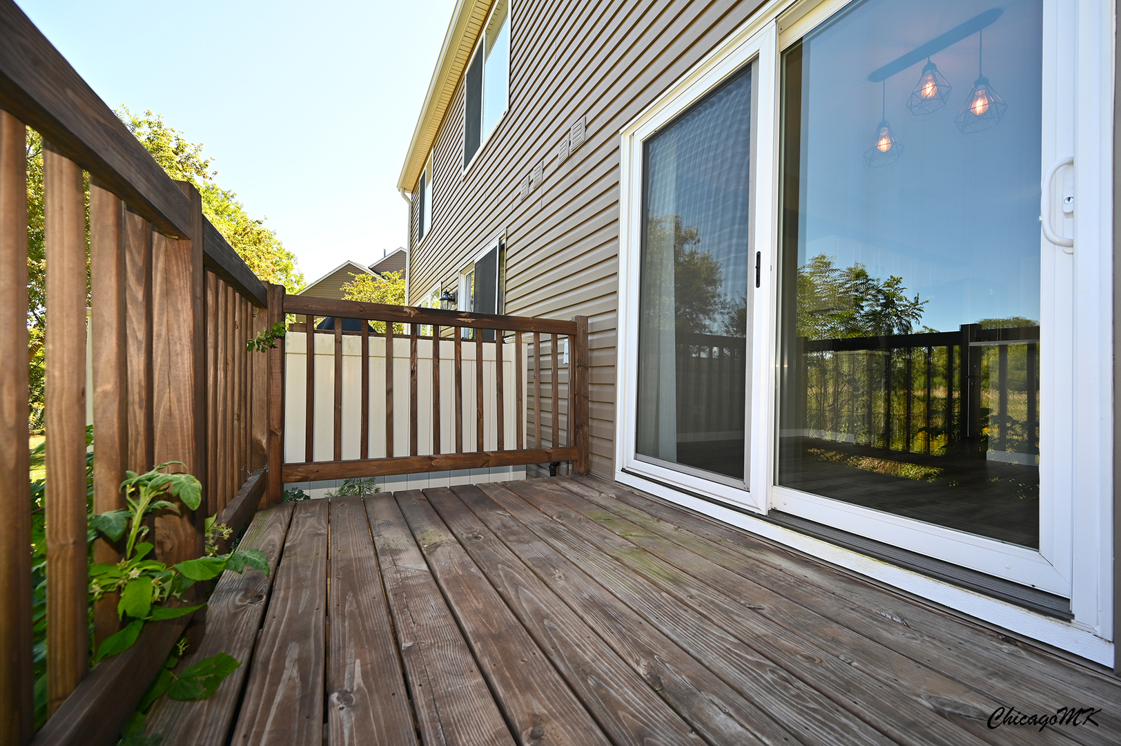 425 Locksley Drive Streamwood, IL 60107 - Photo 37 of 48 a view of a balcony with wooden floor