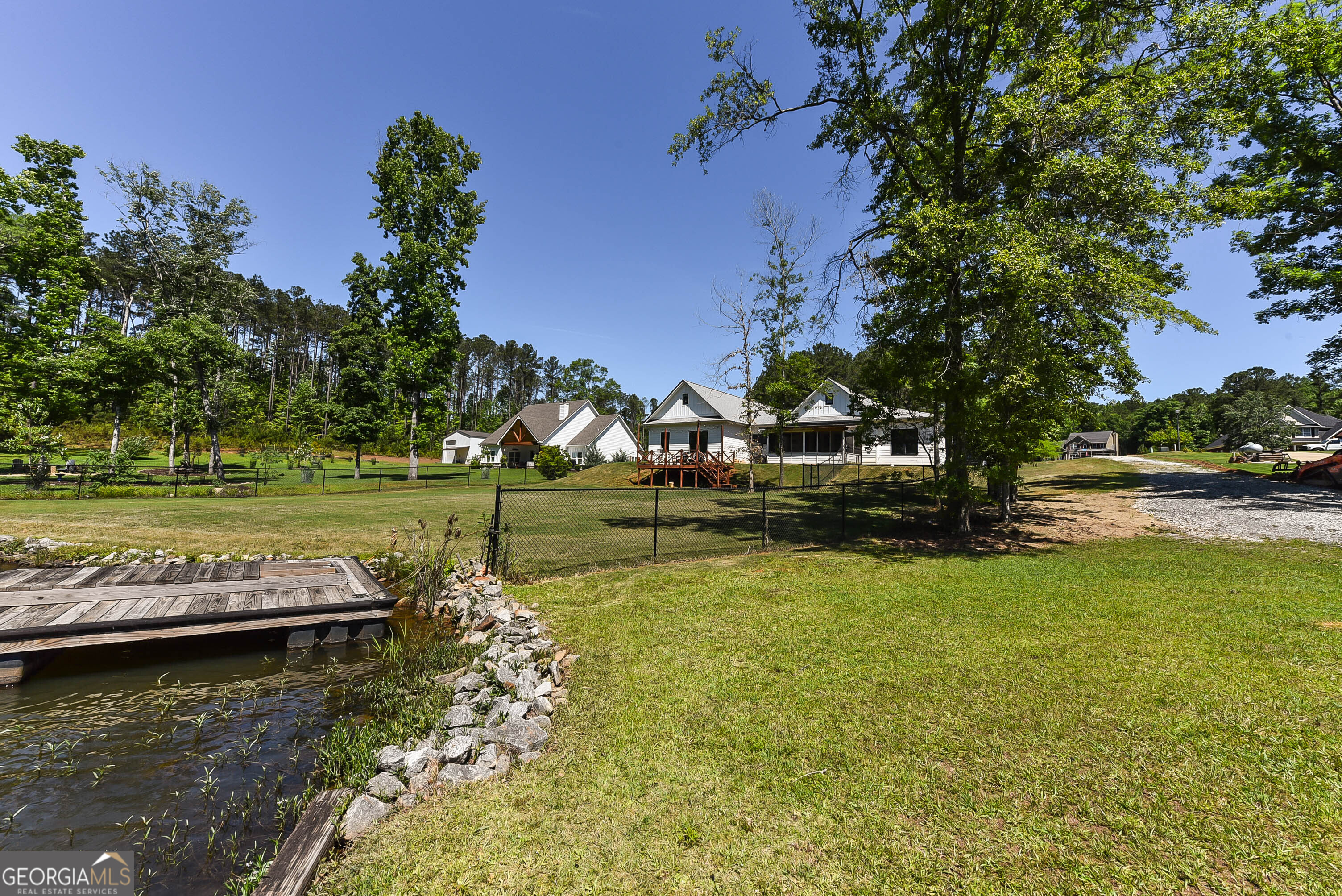 209 Lee Road Salem, AL 36874 - Photo 24 of 37 a view of a lake with houses