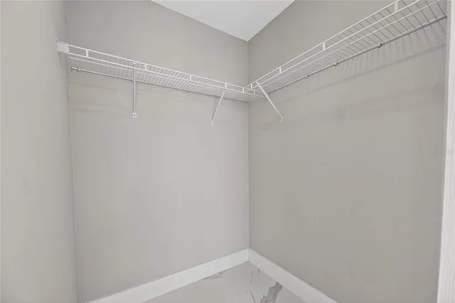 a view of an empty walk in closet