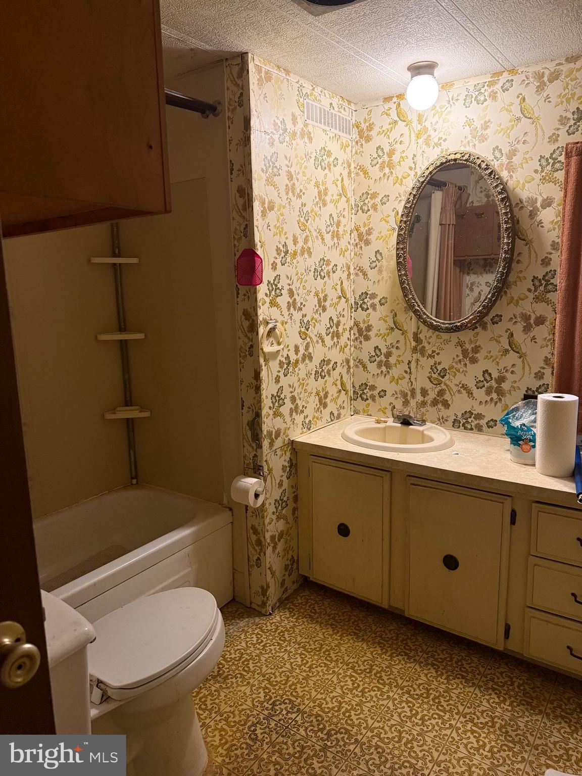 11493 Ross Lane Delmar, DE 19940 - Photo 10 of 10 a bathroom with a toilet sink and mirror