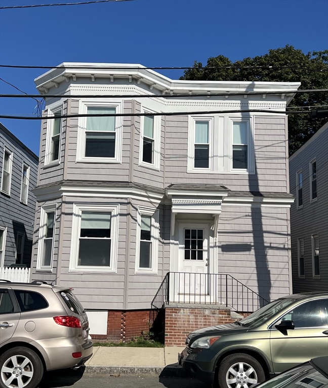 441 Winthrop Street Winthrop, MA 02152 - Photo 1 of 10 a front view of a house with a parking space