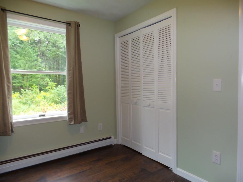 76 Martin Stream Road Fairfield, ME 04937 - Photo 12 of 27 First floor bedroom 2 has a laundry...
