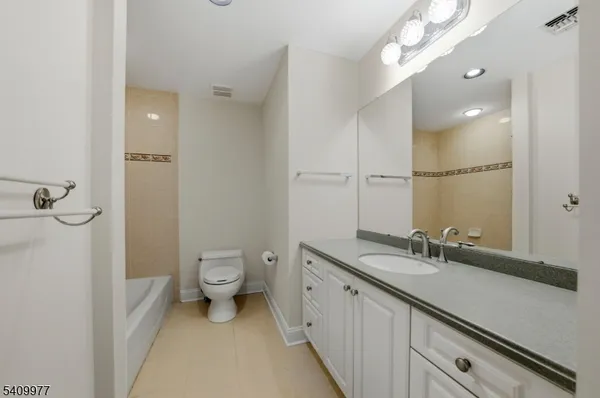 an empty room with an empty space and empty shelves