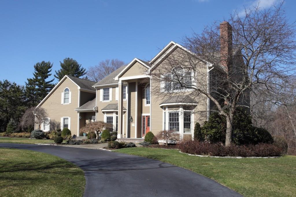 245 Oregon Road Cheshire, CT 06410 - Photo 1 of 1 a front view of a house with a yard