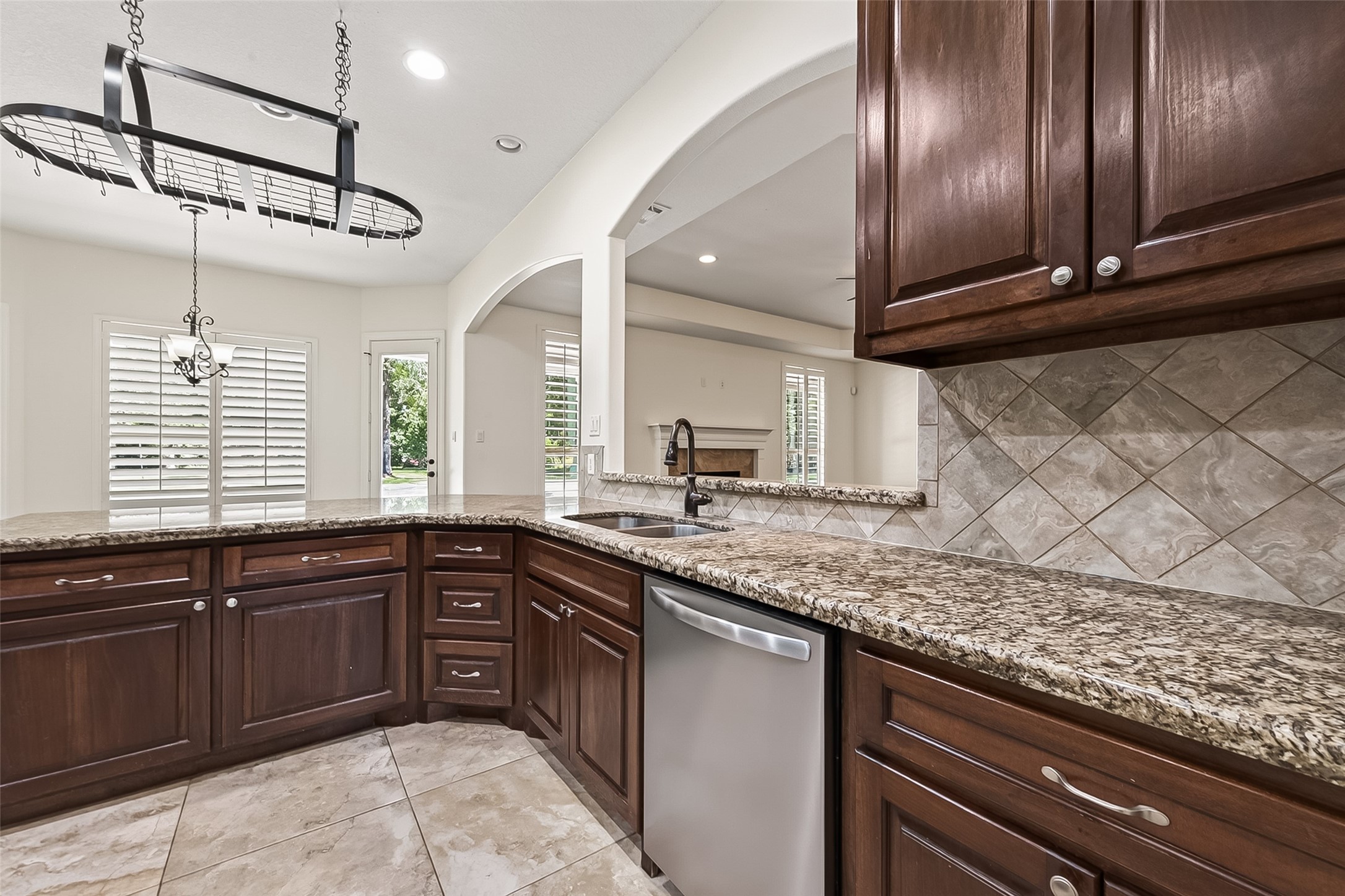 22040 Robins Road Hockley, TX 77447 - Photo 14 of 44 Kitchen with granite countertops and wood cabinets