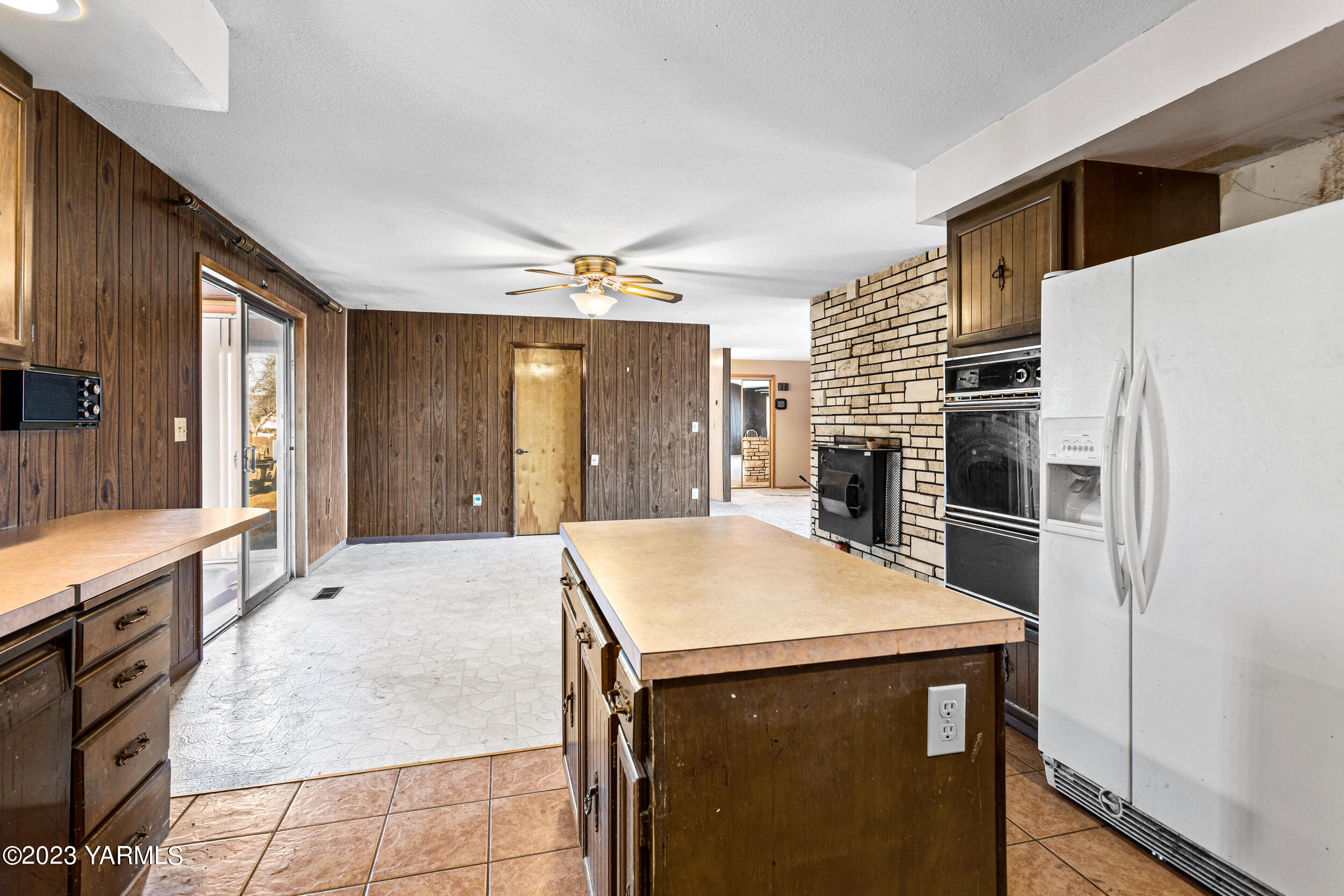 3570 Lateral B Road Wapato, WA 98951 - Photo 15 of 32 a kitchen with a refrigerator and a sink