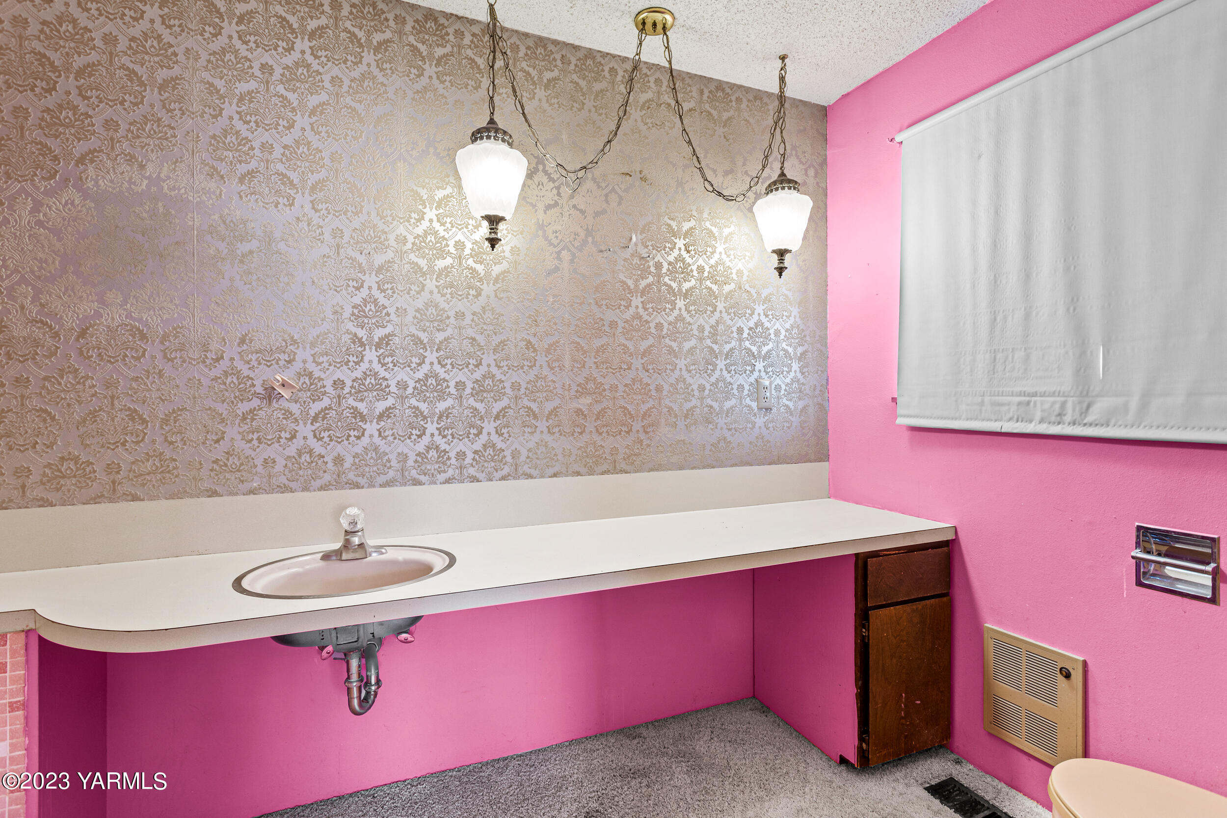 3570 Lateral B Road Wapato, WA 98951 - Photo 21 of 32 a bathroom with a sink a mirror and a shower