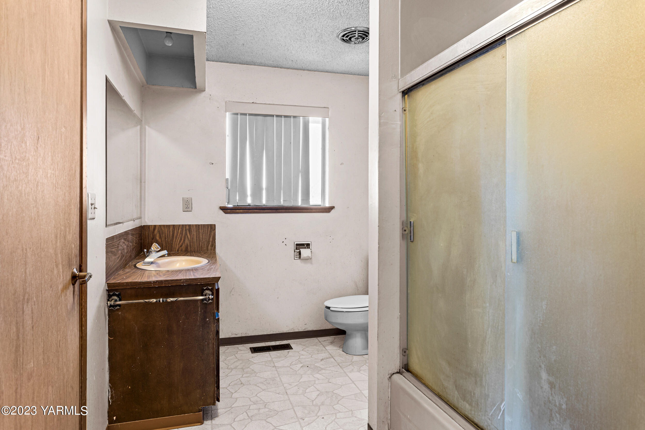 3570 Lateral B Road Wapato, WA 98951 - Photo 25 of 32 a bathroom with a sink and toilet