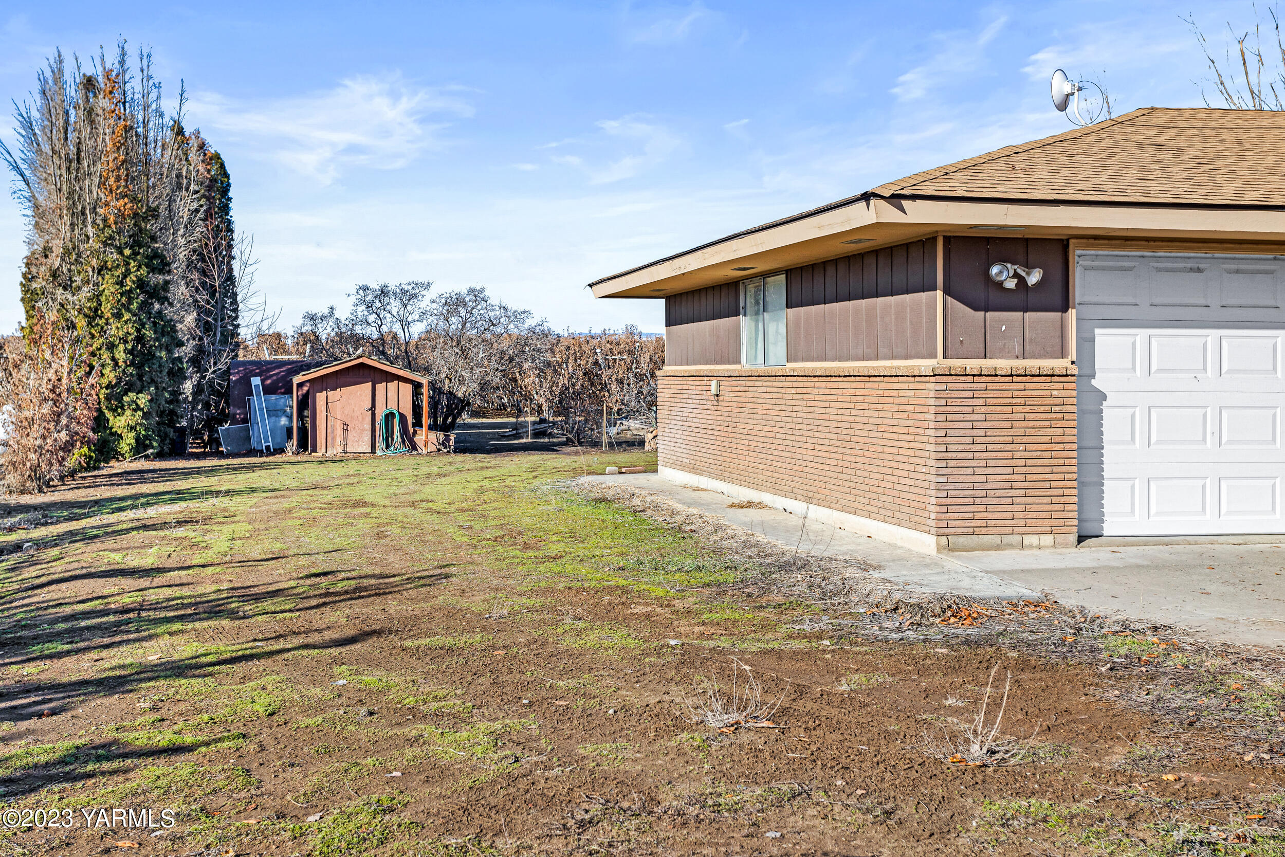 3570 Lateral B Road Wapato, WA 98951 - Photo 27 of 32 a front view of a house with a yard