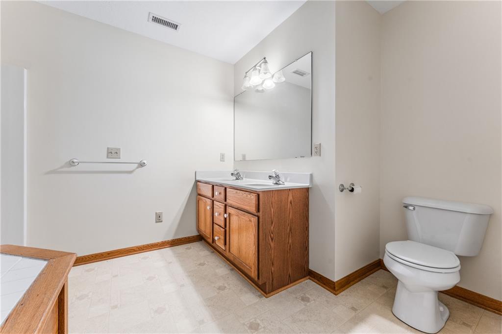 810 Hamburg Road Fredonia, PA 16124 - Photo 33 of 45 a bathroom with a sink a toilet and mirror