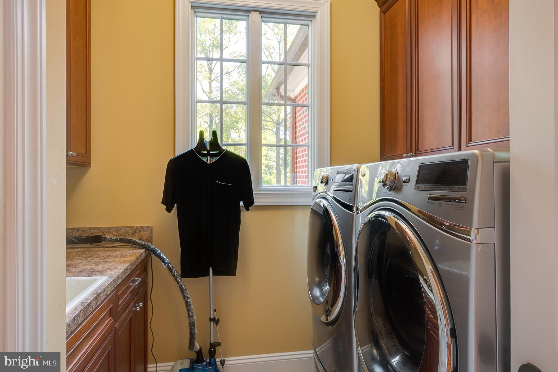 394 South River Landing Road Edgewater, MD 21037 - Photo 22 of 50 Separate laundry room with built-in cabinets