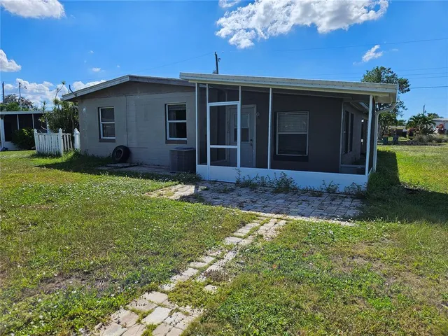 a view of a house with a garden