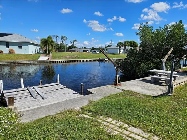 a view of a lake with a house