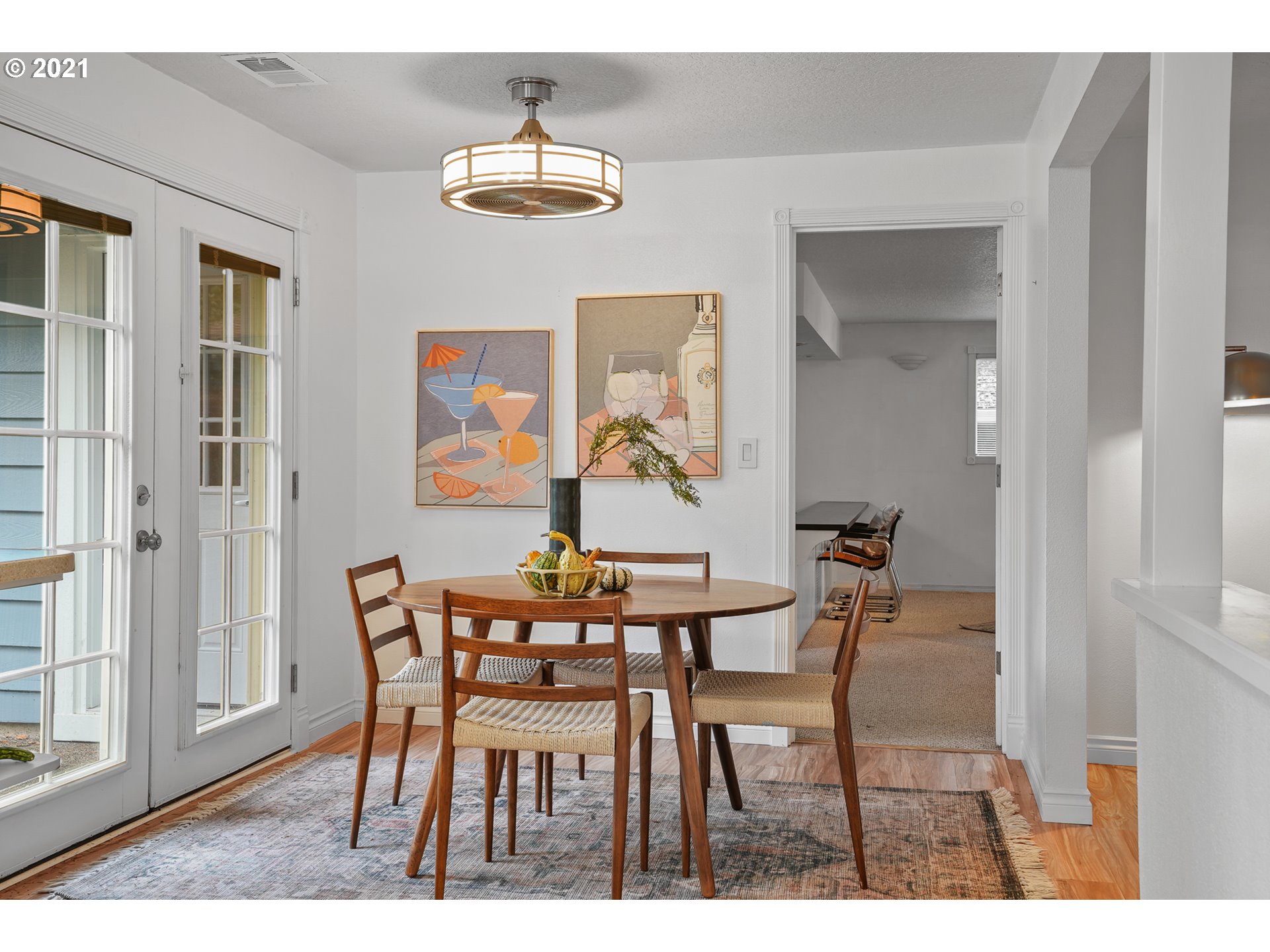 45 Southwest Collins Street Portland, OR 97219 - Photo 11 of 28 a view of a dining room with furniture and chandelier