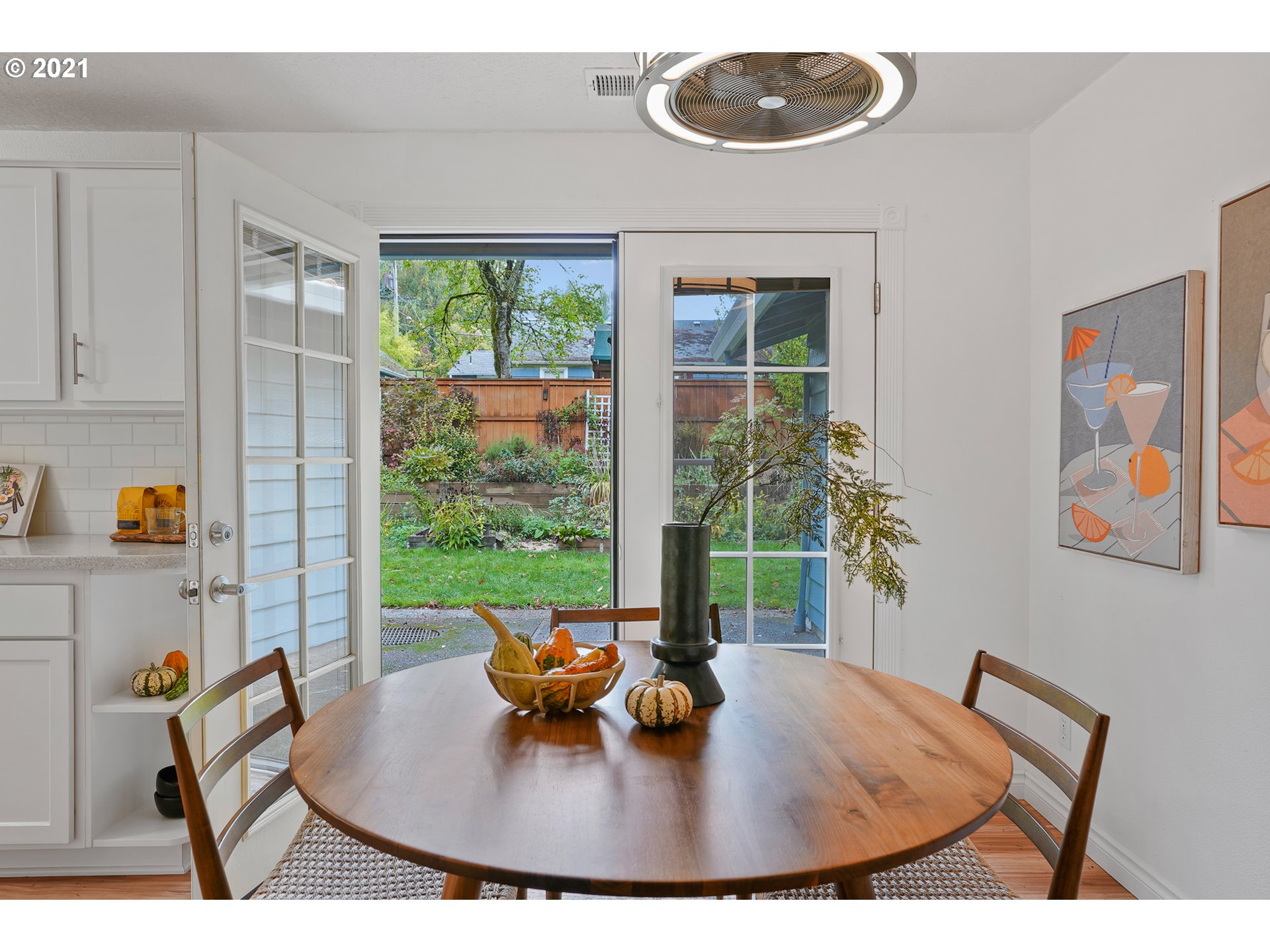 45 Southwest Collins Street Portland, OR 97219 - Photo 12 of 28 a view of a dining room with furniture window and outside view