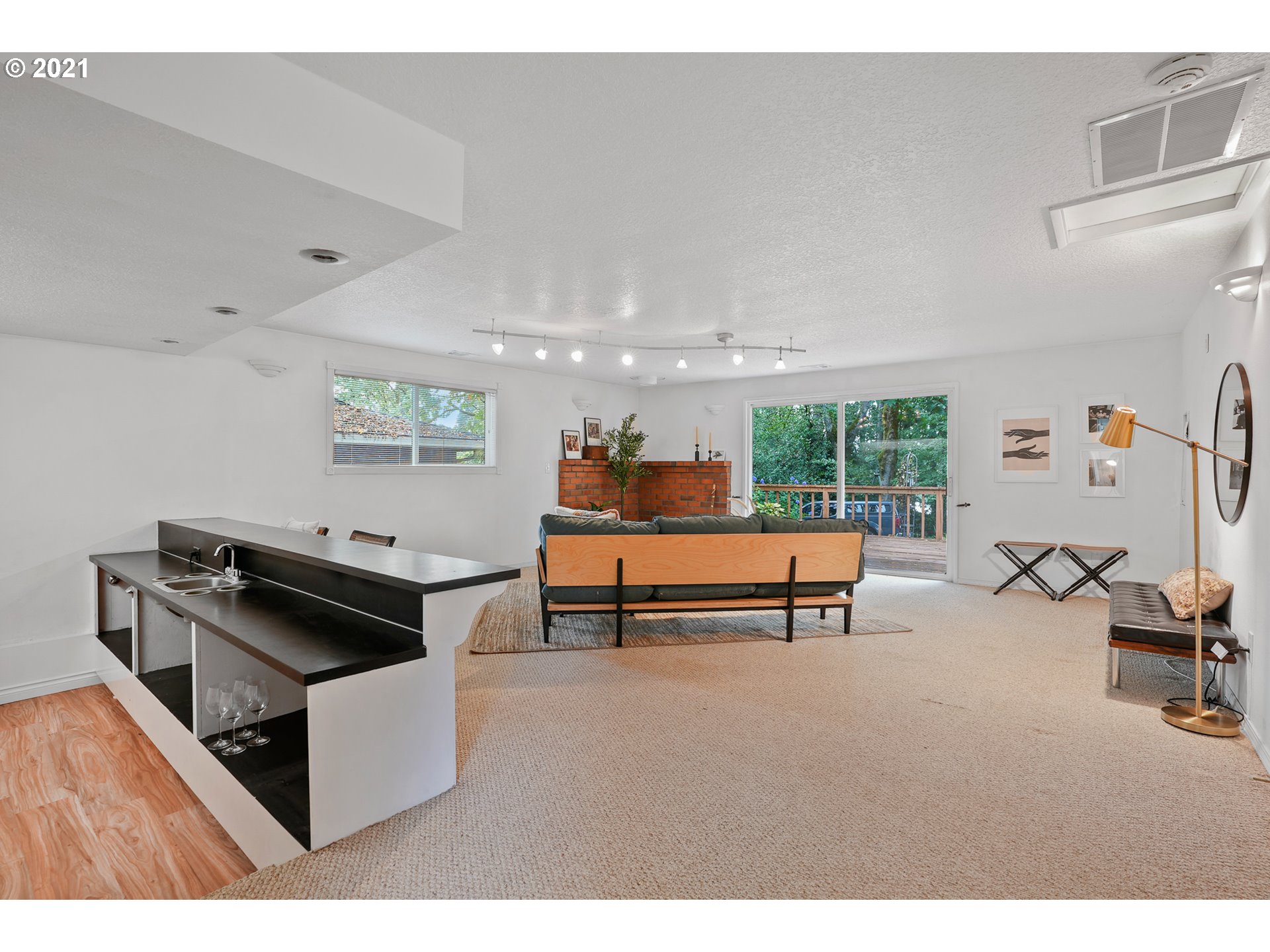 45 Southwest Collins Street Portland, OR 97219 - Photo 14 of 28 a reading room with furniture and wooden floor