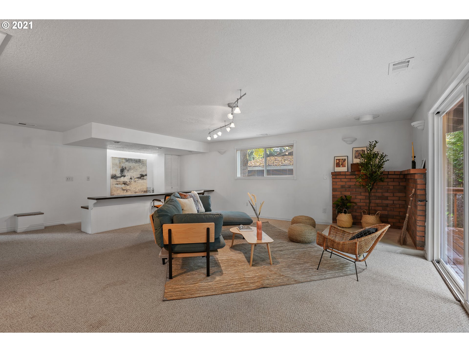 45 Southwest Collins Street Portland, OR 97219 - Photo 16 of 28 a living room with furniture and wooden floor