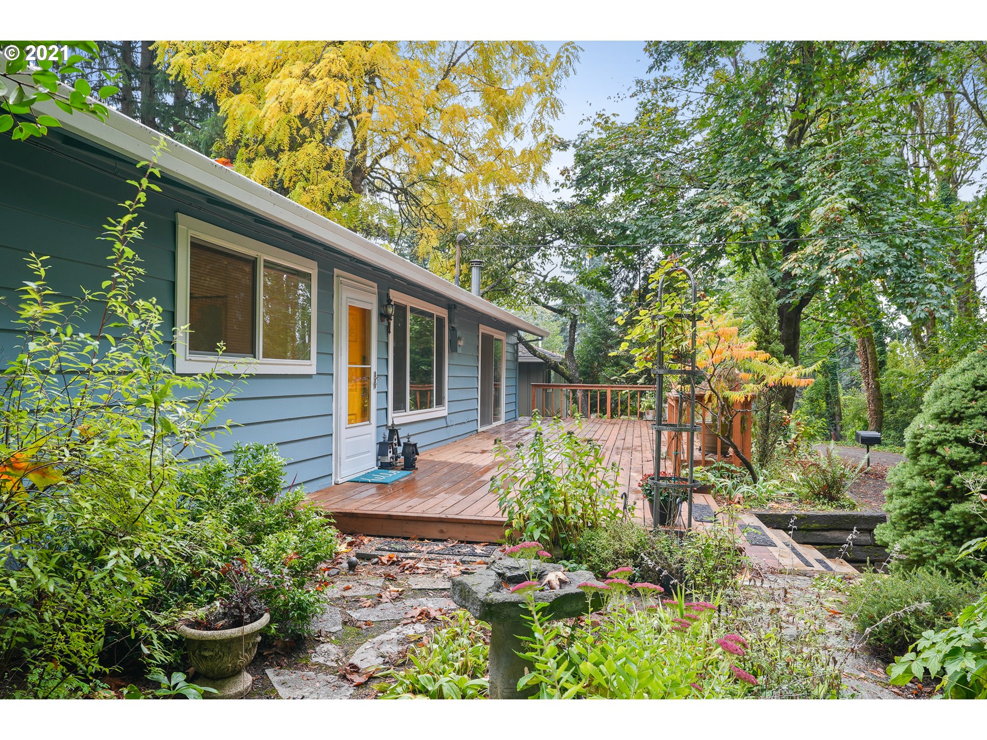 45 Southwest Collins Street Portland, OR 97219 - Photo 2 of 28 a view of a house with backyard
