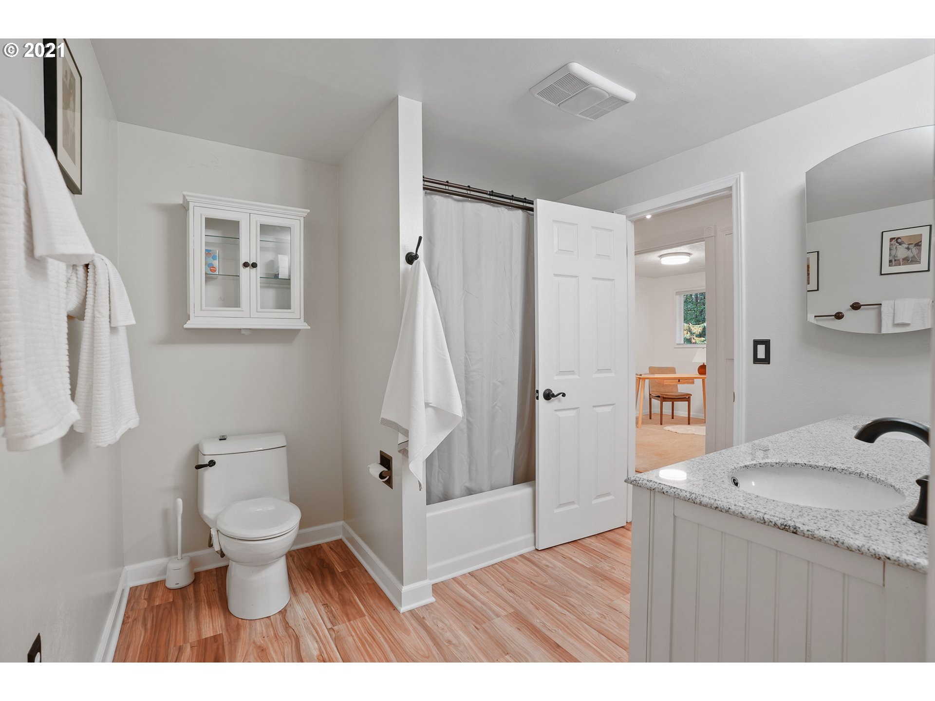 45 Southwest Collins Street Portland, OR 97219 - Photo 21 of 28 a bathroom with a sink a toilet and shower