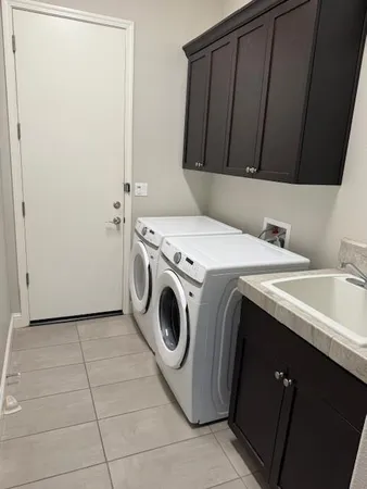 a view of backyard with large tree