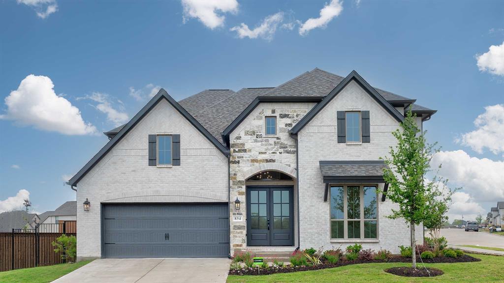 854 Stoney Bridge Way Lavon, TX 75166 - Photo 1 of 36 a front view of a house with garden