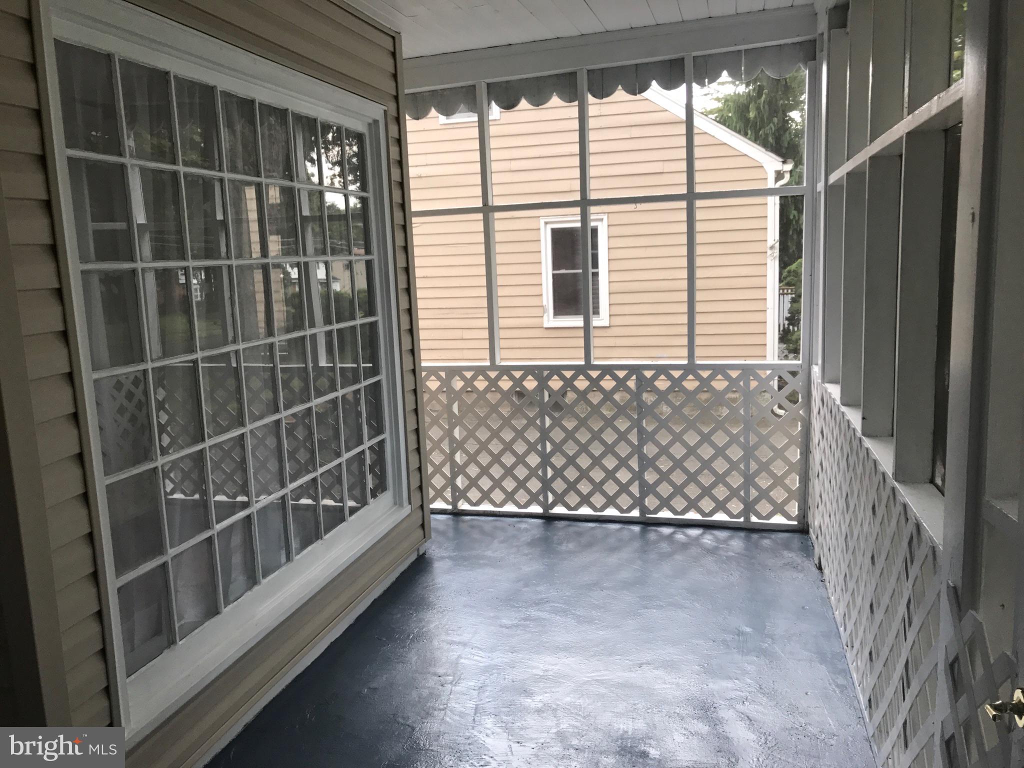 1206 Lower Ferry Road Trenton, NJ 08618 - Photo 3 of 19 Front porch sitting area