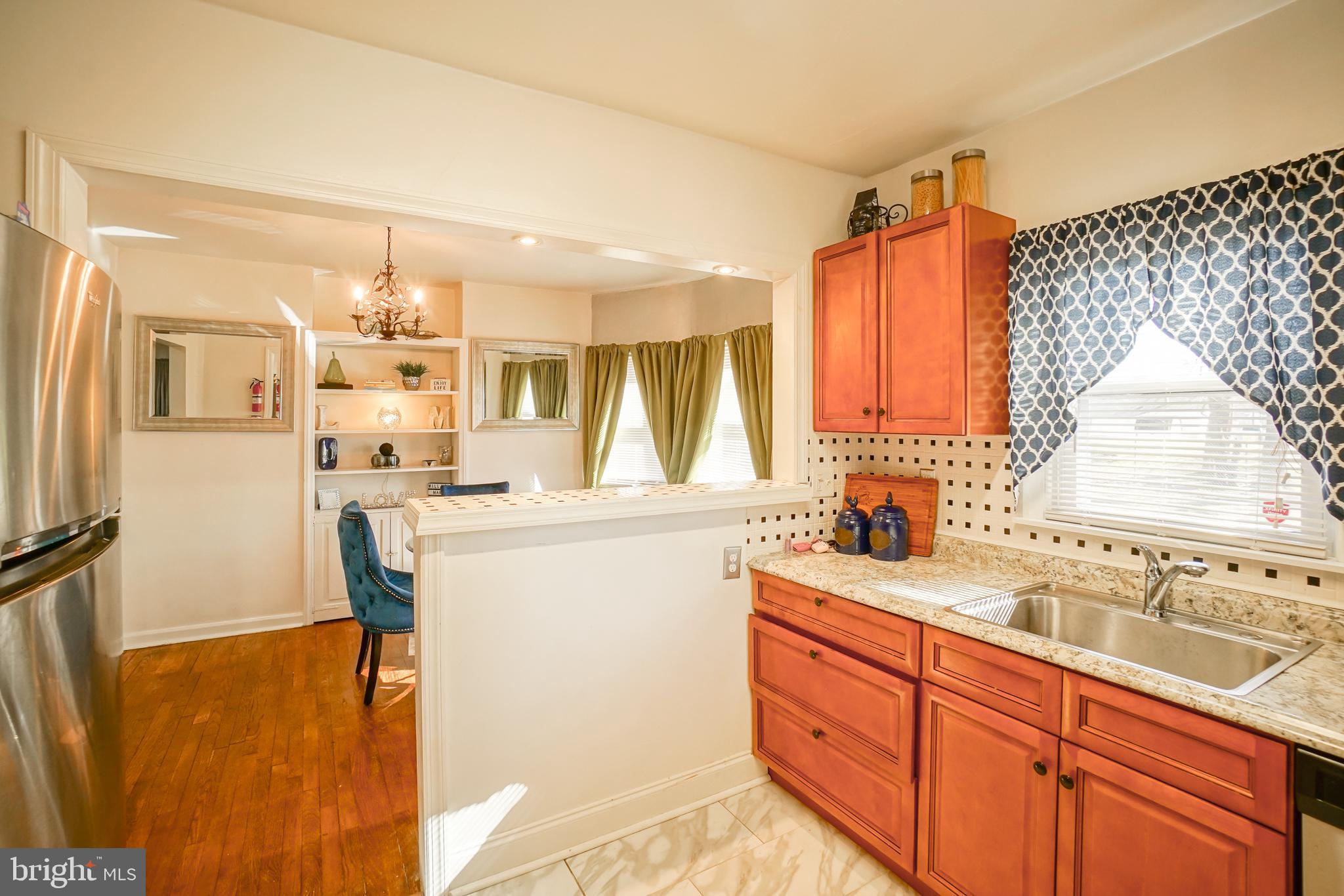 1206 Lower Ferry Road Trenton, NJ 08618 - Photo 8 of 19 Kitchen into Dining Area