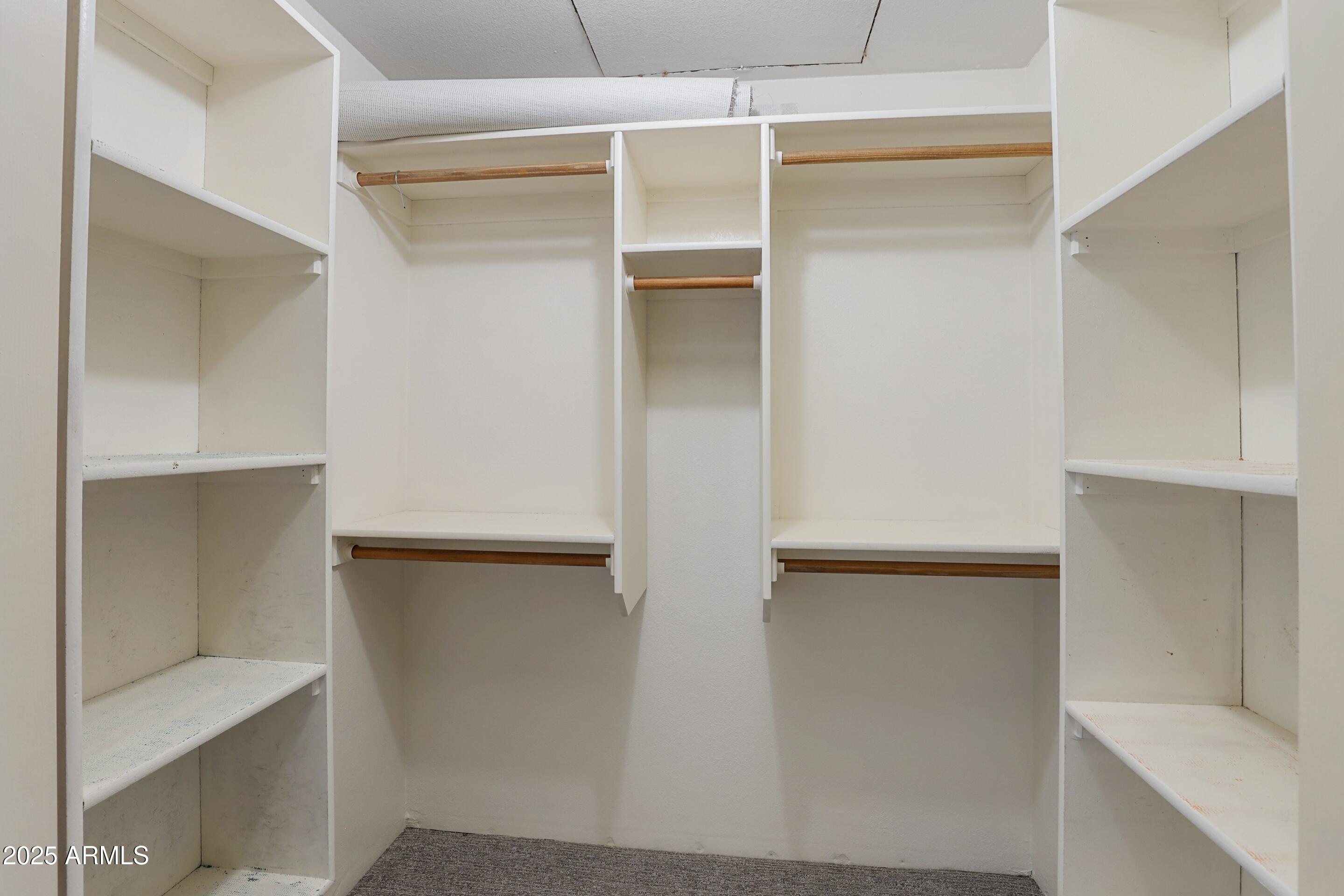 1506 North Easy Street Payson, AZ 85541 - Photo 11 of 17 a view of walk in closet with empty racks