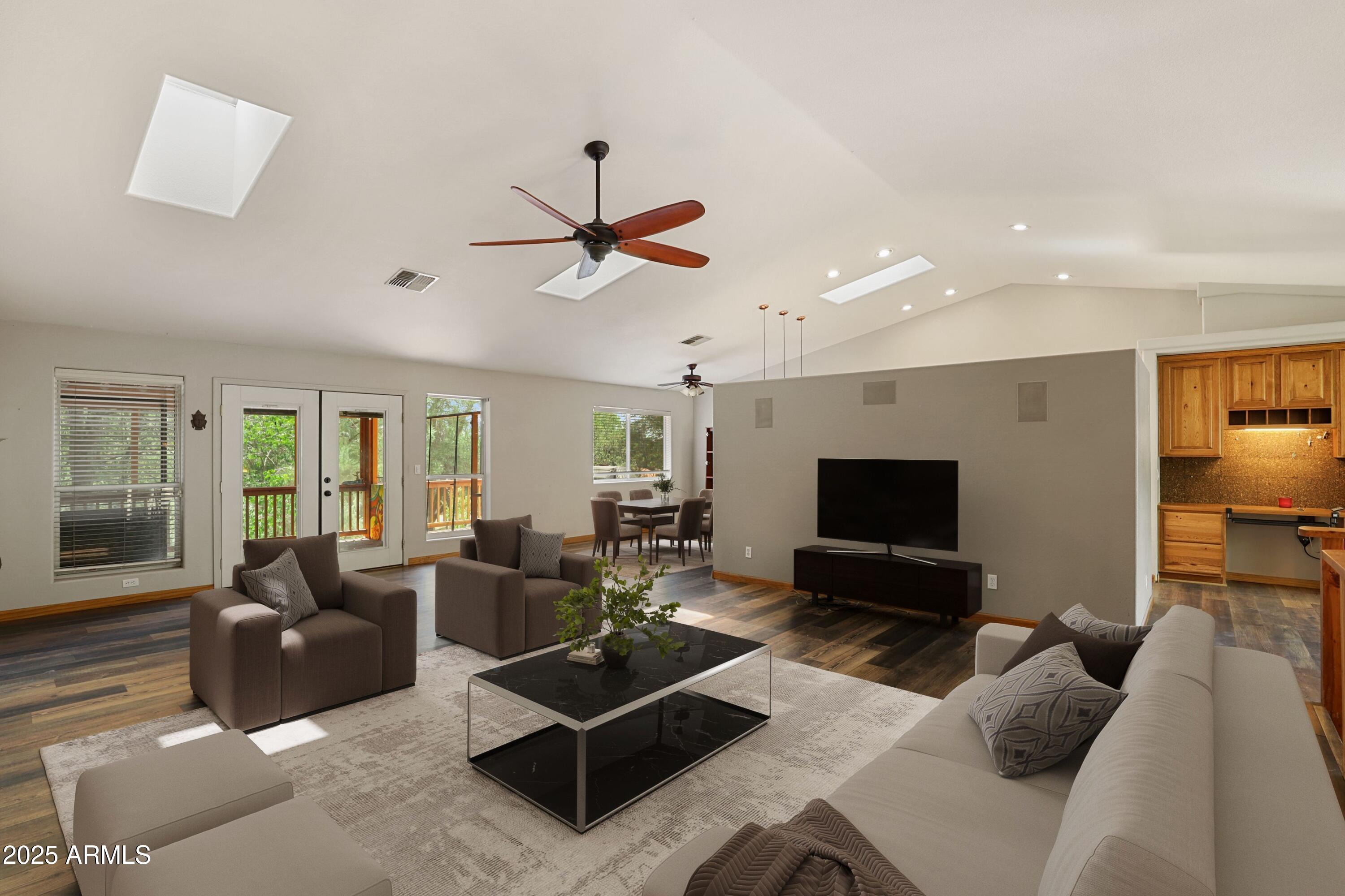 1506 North Easy Street Payson, AZ 85541 - Photo 2 of 17 a living room with furniture and a flat screen tv