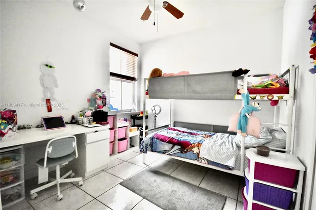 a bedroom with furniture and a bed